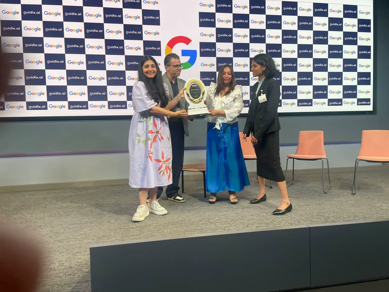 Delegates felicitated in front of the Google × Guidix.ai backdrop